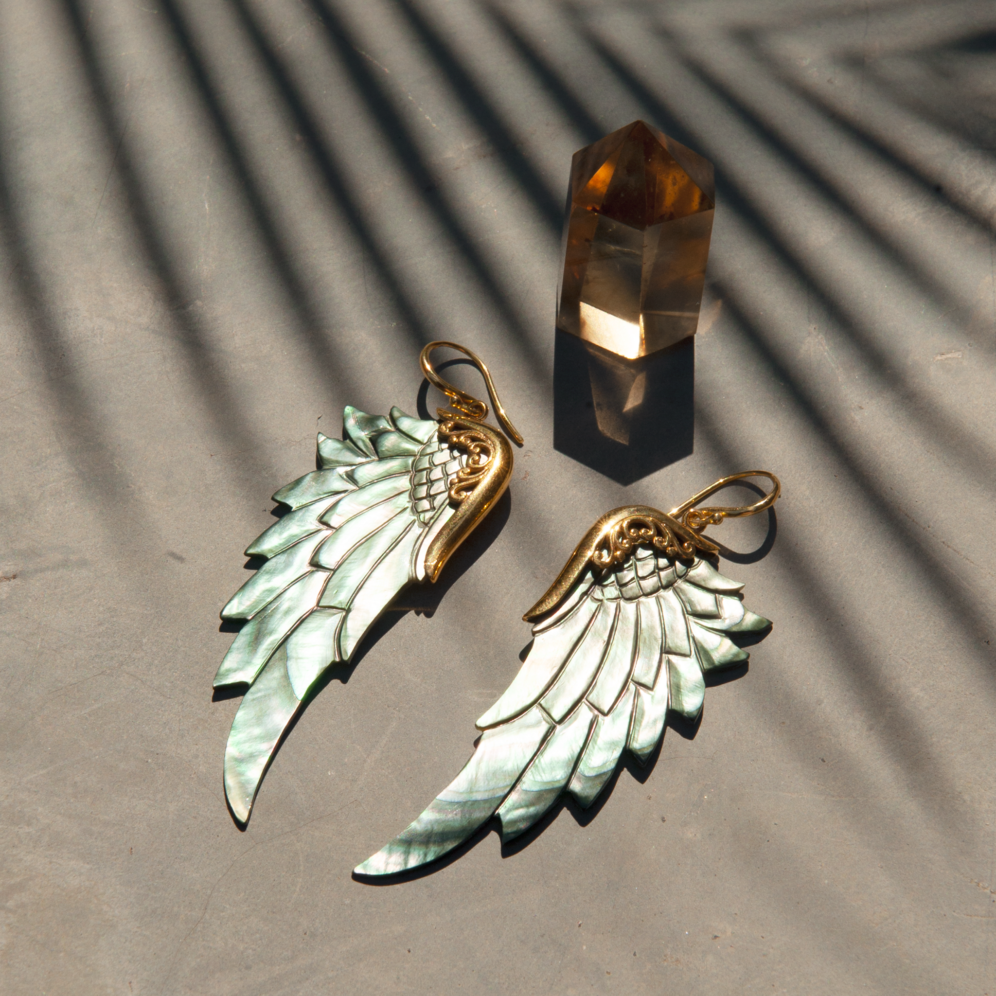 large black gold angel wing earrings 